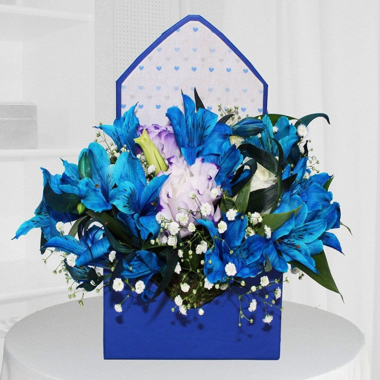 Envelope de flores azuis