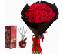 Buquê de rosas vermelhas em papel preto com laço vermelho acompanhado de óleo difusor de aromas Velvet Cherry Dani Fernandes, entrega em Belo Horizonte.
