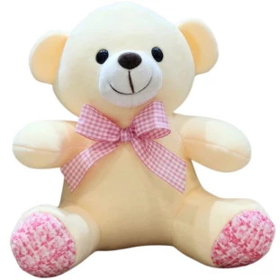 Ursa de pelúcia branca com laço rosa e detalhes nos pés, modelo Ursa Princesa