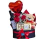 Box com rosas vermelhas, vinho, Ferrero Rocher, ursinho e balão em formato de coração da Ikebana Flores