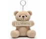 Chaveiro de ursinho de pelúcia cor creme segurando placa escrito 'eu te amo'