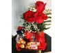 Cesta de chocolates com flores