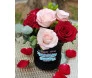 Box de arranjo de rosas vermelhas e rosas rosadas